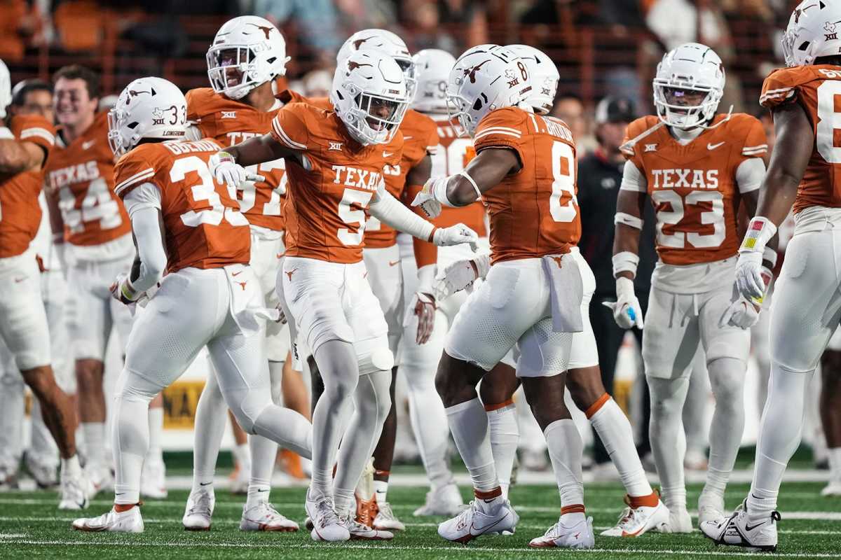 The Texas Longhorns defense celebrates another stop